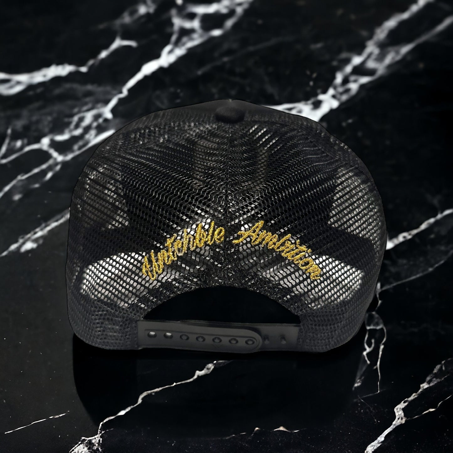 UNTCHBLE AMBITION Black/Gold Trucker Hat